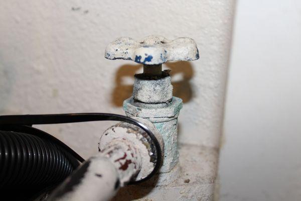 This is the corroded faucet that Ross Maghami let his client pass off to an unsuspecting buyer.