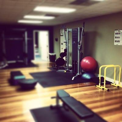 This is the gym before he changed the color scheme, and did the floors over! You think this is nice?! Come see it now!