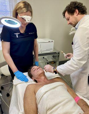 Dr. Tackett and Denise with a patient getting PRP Injections.