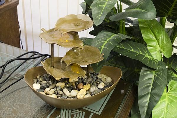 Allen provides this feng-shui enhancing water sculpture to soothe the mind while he patiently explains the enigmas of the AMT.