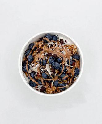 Check out our delicious protein yogurt full with fresh fruit and a sprinkle of almond butter