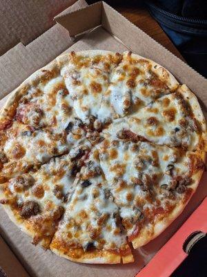 Queen size - Pepperoni, sausage and mushroom pizza.