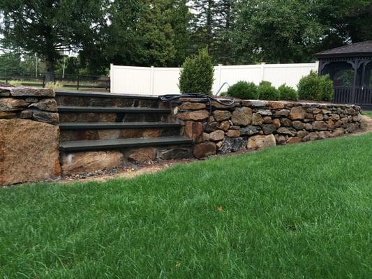 field stone wall with blue stone steps. STORRS,CT