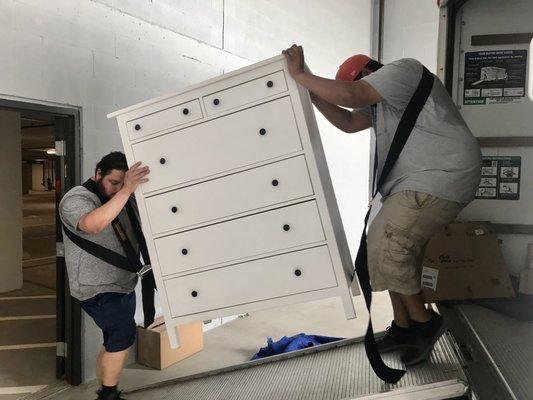 This dresser was full.  There was no way I could lift is but these guys and the straps made it look like it was empty.