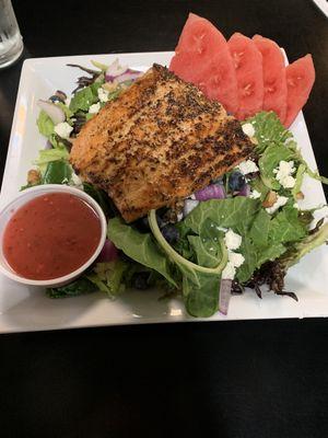 Salmon topped salad.