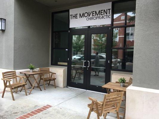 Practice front entrance with teak seating