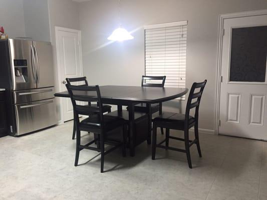 Beautiful Ashley Ridgley Counter Height table with wine compartment! Absolutely love it!