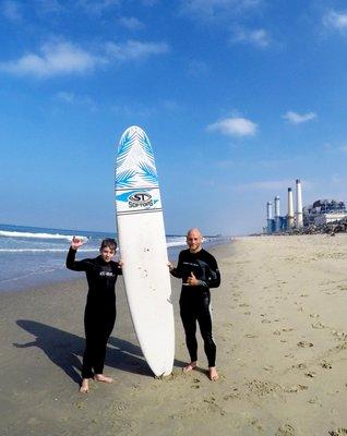 Stoked Dad & Son after riding waves!