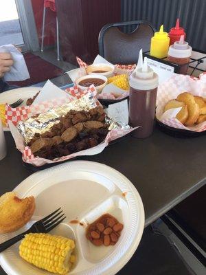 Family Dinner Deal Burnt ends sausage and brisket with corn beans and garlic toast Get this