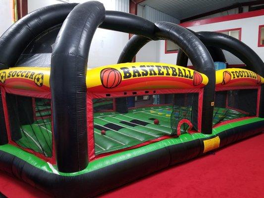 A giant sports arena is waiting for you during your party time.  Hop in and slam dunk on our inflatable basketball goals!