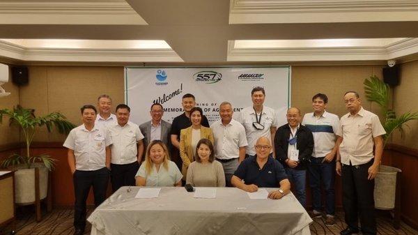 contract signing for buying biocleaner units for their chicken processing plant