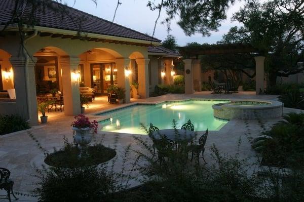 Traditional style pool with raised spa.