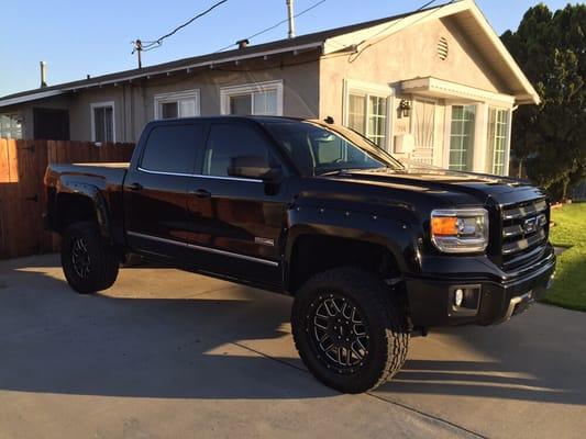 2014 GMC Sierra 20% and limo the 3 back Windows,city Montebello, one of my favorite trucks.