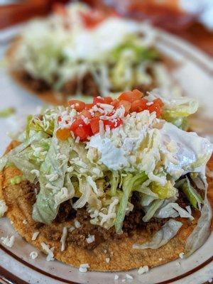 Side order: beef tostadas. We covered it with extra cheese:).