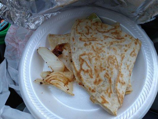 Hardly a $7 quesadilla with inedible onions