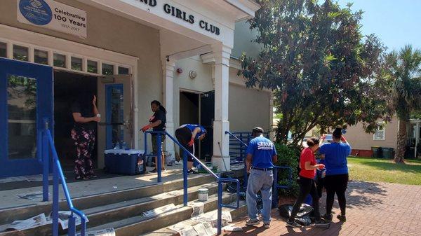 Volunteers from Impact Savannah Serve team sprucing up the Boys and Girls Club for the summer.