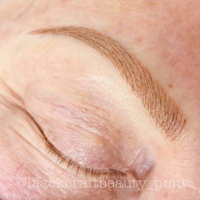 Close up view of Microblading+ shading on mature skin