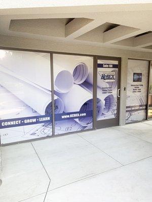 Perforated vinyl install. Perf vinyl lets you see out from inside, and lets you see a graphic from the outside.