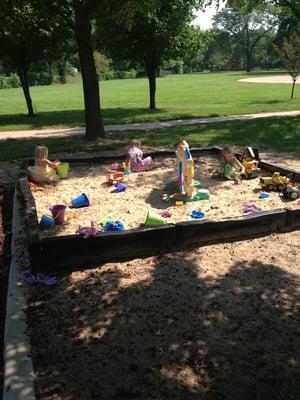 Sand box with toys