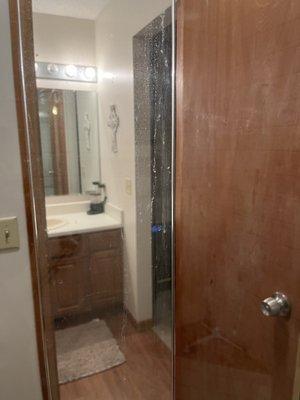 This is a glass shower door.