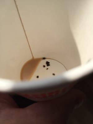 Something in button of my coffee. Gross!!