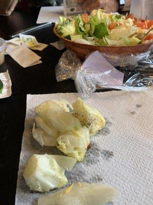 The parts of the salad that were inedible. The rest of it was C rated iceberg lettuce. Extremely dull.