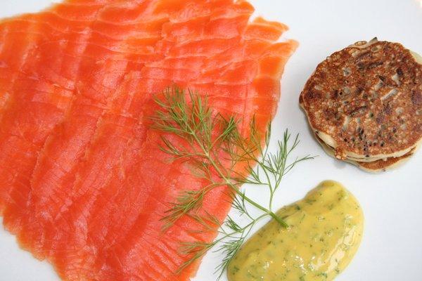 Wild King salmon gravlax with wild rice blinis and Swedish mustard sauce