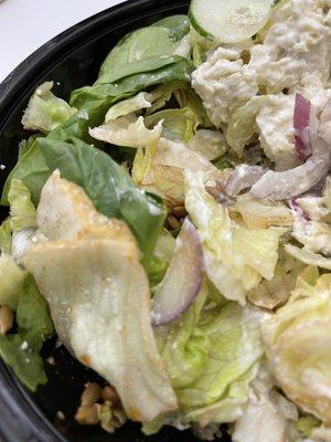 Summer chicken salad made with wilted lettuce.