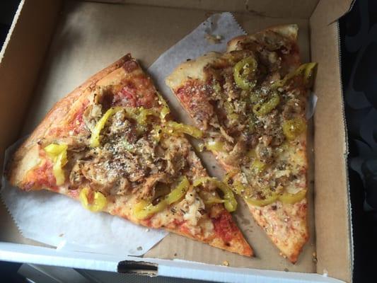 I bought two slices of chicken and banana pepper pizza which comes with a 20oz soda.