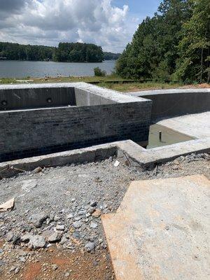 Terrible concrete work that later needed to be floated - pool still unfinished