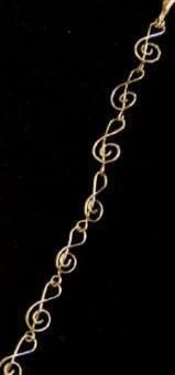 Local wire artist Heather Trundle makes Moonlight Wrapture jewelry and also teaches classes! Treble Clef sterling bracelet $40