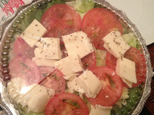 Where are the Roasted Red peppers in my $9 salad? They don't exist. Just iceberg, Tomatoes and Sliced cheese. Ridiculous