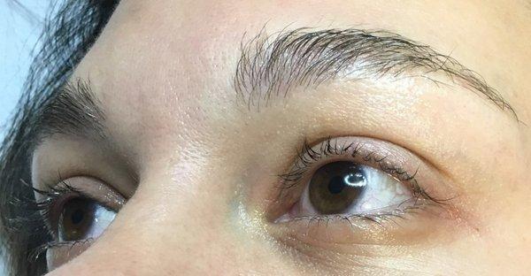 Before getting my brows, bold, winged liner on the top, lash enhancement on the bottom. No makeup, no filter. July 27th, 2016.