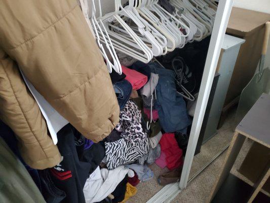 My wife's clothes dumped into the closet as part of their "full unpack'.