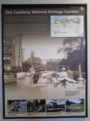 A sign discussing the Erie Canalway National Heritage Corridor in the Erie Canal Discovery Center.