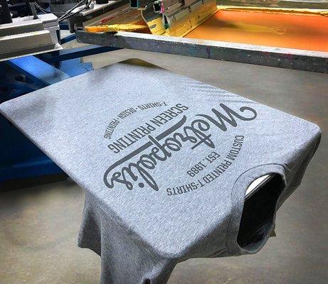 Printing our own promotional shirts.