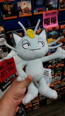 Meowth plush doll.