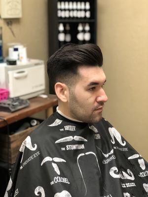 Fade with a pompadour! Done by Cortney! Blow dried and styled