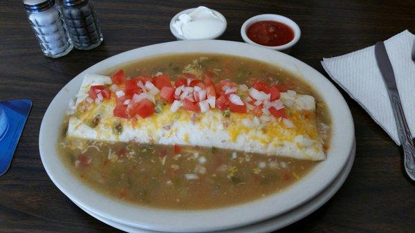 Smothered breakfast burrito and salsa n sour cream