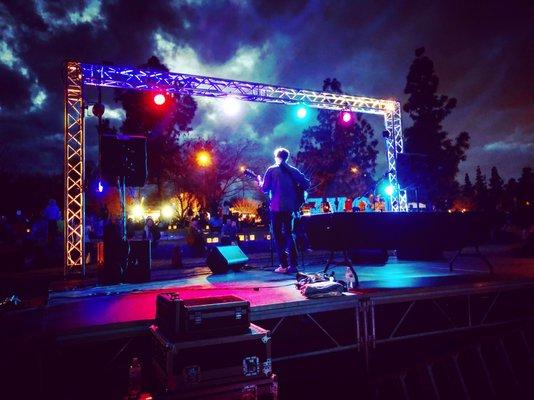 Festival stage at night.