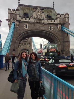 Walking across the Tower Bridge.