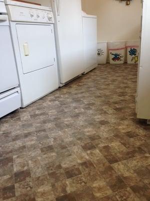 Our beautiful new kitchen floor.  Thank you!