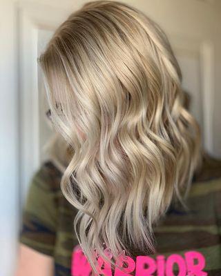 Gorgeous blonde by our stylist, Mackenzie at Brieshi Salon in Rogers, featuring Aveda services for hair and skin.