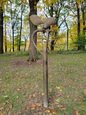 Bee and flower sculpture