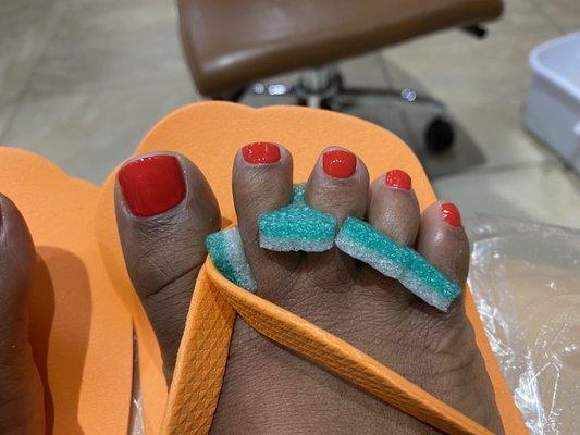 Toes are polished perfectly.