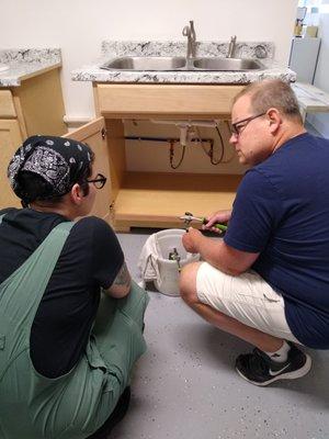 Kristen learns sink basics @ Home Repair Lab