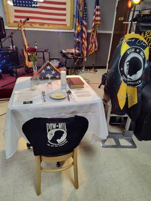 The POW/MIA Remembrance program table and the POW/MIA flag