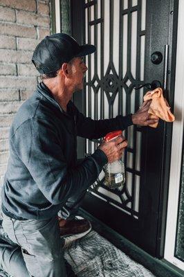 Technician polishing a Titan Security Door