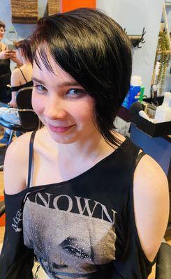 Side pixie, red root shadow with blue black hair