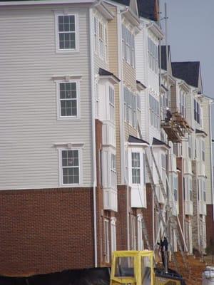 Putting gutters on townhouses in Clarksburg, MD